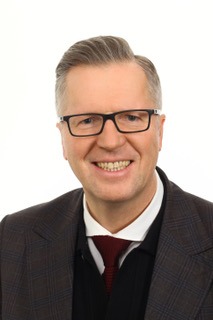 dr Tomasz Kałużny